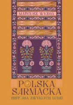 pomarańczowa okładka ze wzorem kwiatowym w odcieniach różu, pod spodem tytuł